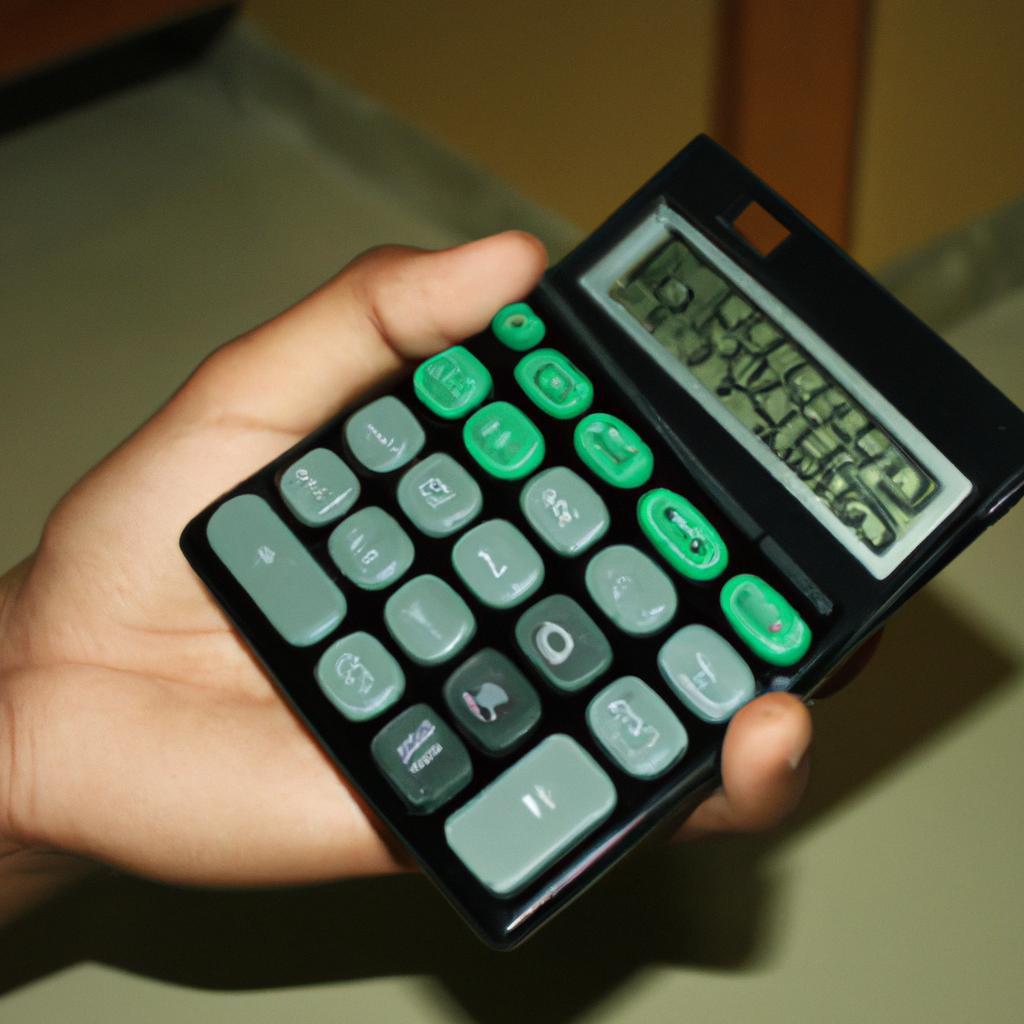 Person holding a calculator, planning