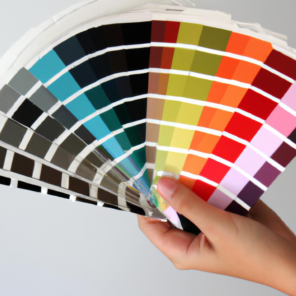 Person holding paint swatches